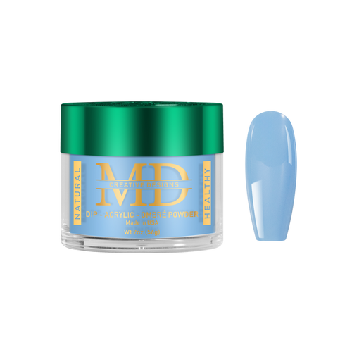 Jar of MD with a light blue nail tip color swatch on a white background