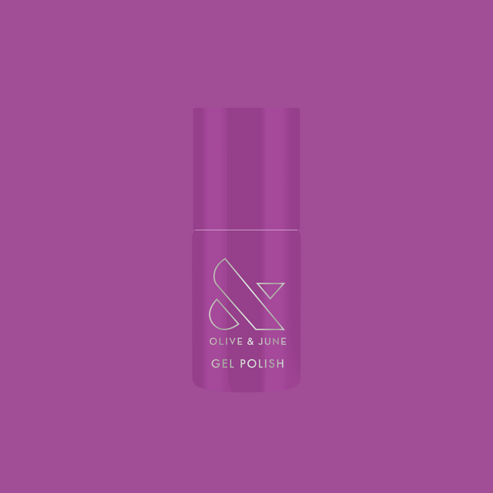 Bottle of Olive and June Petal - Gel polish in vibrant floral purple shade on matching purple background
