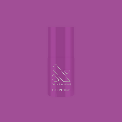 Bottle of Olive and June Petal - Gel polish in vibrant floral purple shade on matching purple background