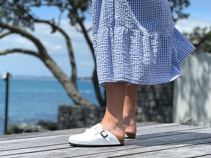 Quality European women's sandals. Made in Spain contoured cork footbed and rubber sole. clog style sandal that comes in white.