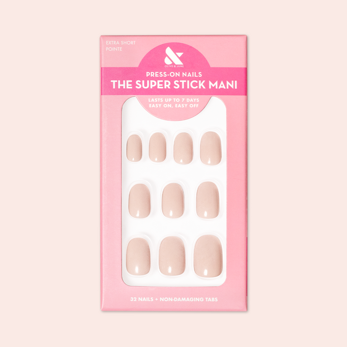 Pointe | Extra Short | Round - Tab Press-On soft ballerina pink press-on nails neatly arranged in pink packaging