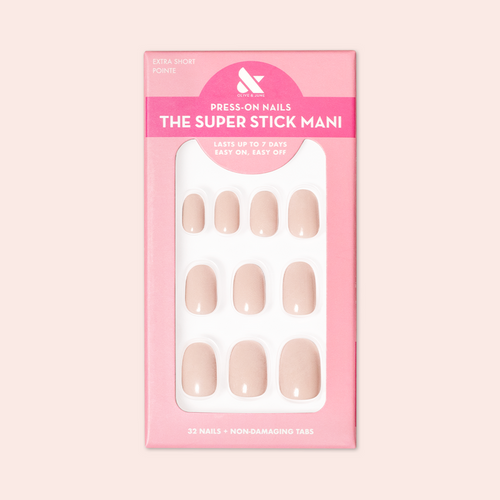 Pointe | Extra Short | Round - Tab Press-On soft ballerina pink press-on nails neatly arranged in pink packaging
