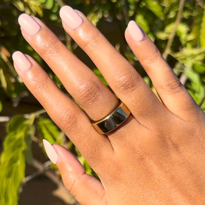 Pointe | Extra Short | Round - Tab Press-On soft ballerina pink press-on mani displayed on hand outdoors with gold ring