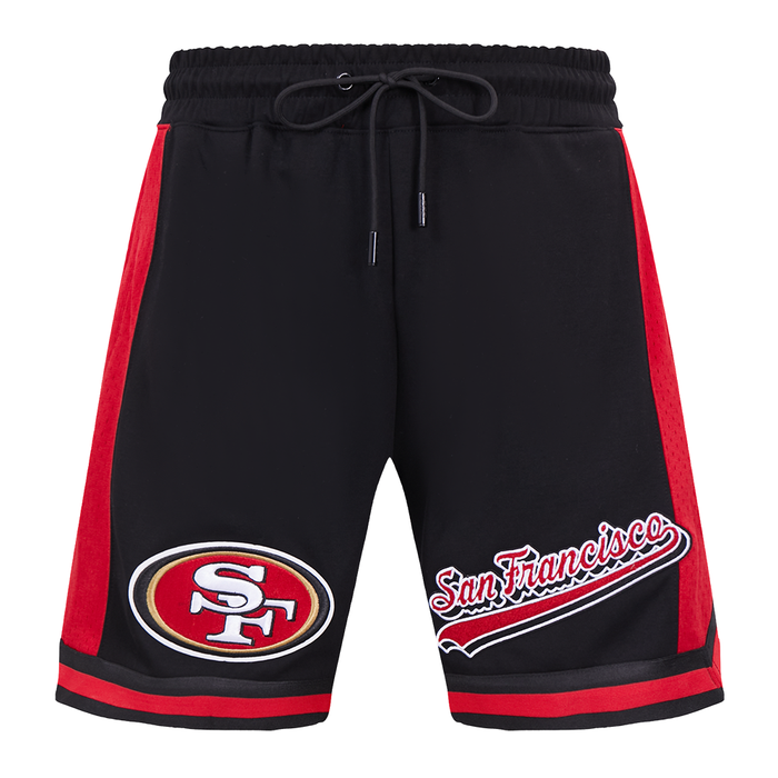 Close-up of the Pro Standard San Francisco 49ers athletic shorts showing the red and black fabric details