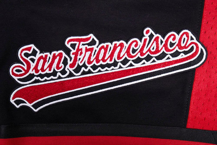 Zoomed-in shot of the waistband and fabric texture of the San Francisco 49ers athletic shorts