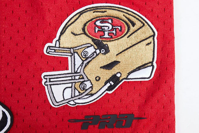 Detailed view of the San Francisco 49ers team logo printed on the shorts in red and white