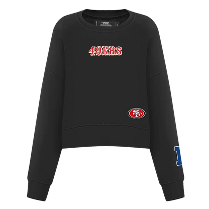 Close-up of the black Wingspan Women's Crewneck showcasing the San Francisco 49ers logo and detailed stitching