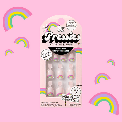 Rainbow Connection - Pressies | Extra Short Short | Round showing pastel pink press on nails with rainbow details in packaging on pink background