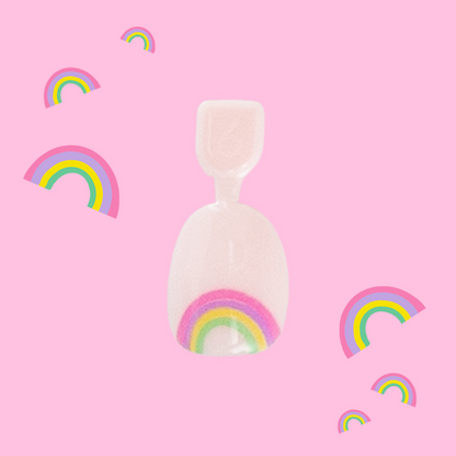 Rainbow Connection - Pressies | Extra Short Short | Round showing pastel pink press on nail with rainbow design on pink background