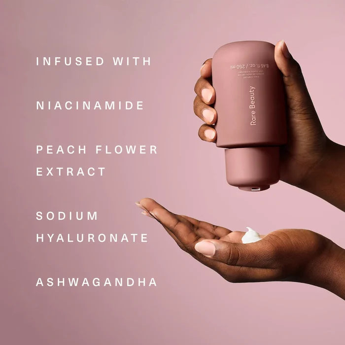 Rare Beauty Find Comfort Niacinamide Hydrating Body Lotion in 850ml bottle, smooth, moisturizing skincare product with a clean design.