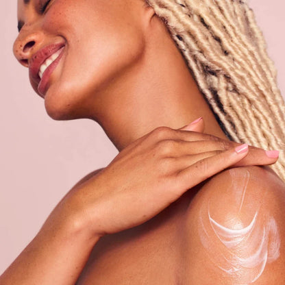 Rare Beauty Find Comfort Niacinamide Hydrating Body Lotion in 850ml bottle, featuring a sleek design and nourishing skincare formula.