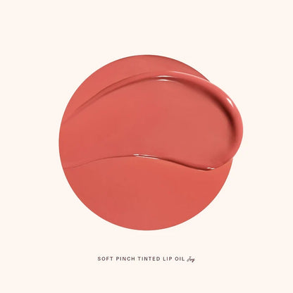 Rare Beauty Soft Pinch Tinted Lip Oil Stain in various shades, displayed on a beauty product image.