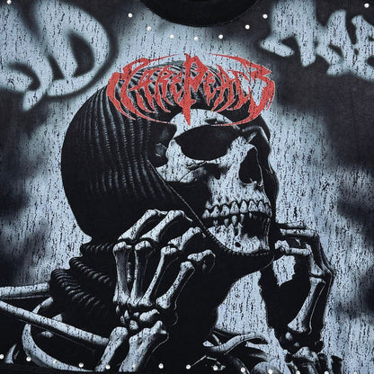 Close-up of the RP Skull rhinestone embellishment on the black 100% cotton tee for a striking visual effect