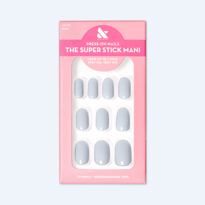 Rink | Short | Round - Tab Press-On icy blue false nails with smooth finish displayed in pink packaging box