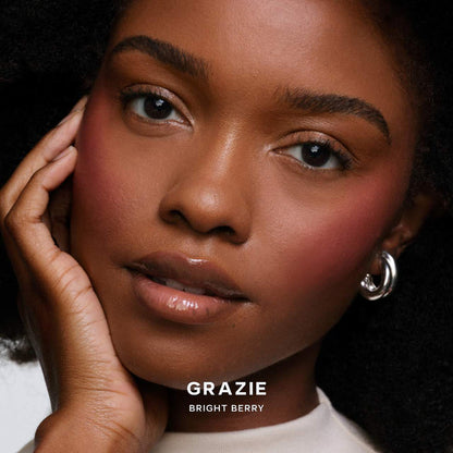 Saie Dew SuperSuede™ talc-free powder blush in multiple shades, close-up of the blush compact with vibrant color options.