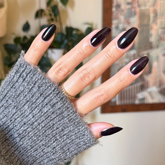 SD - Gel on almond-shaped nails in a sleek deep plum shade for a refined, long-lasting manicure by Olive and June