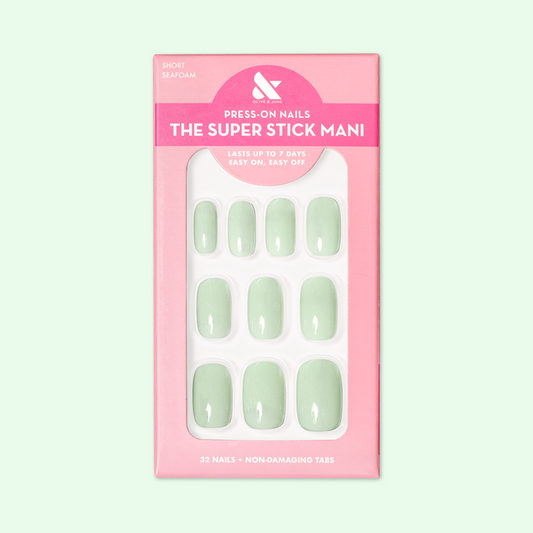 Seafoam | Short | Squoval - Tab Press-On pastel green false nails in pink packaging for easy at-home mani