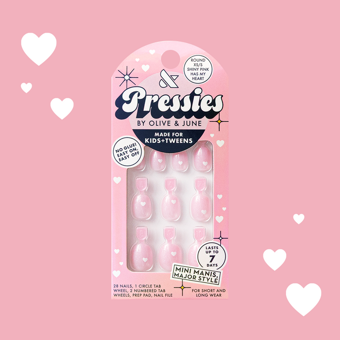 Shiny Pink Has My Heart - Pressies | Extra Short Short | Round showing pink heart-patterned press on false nails in packaging