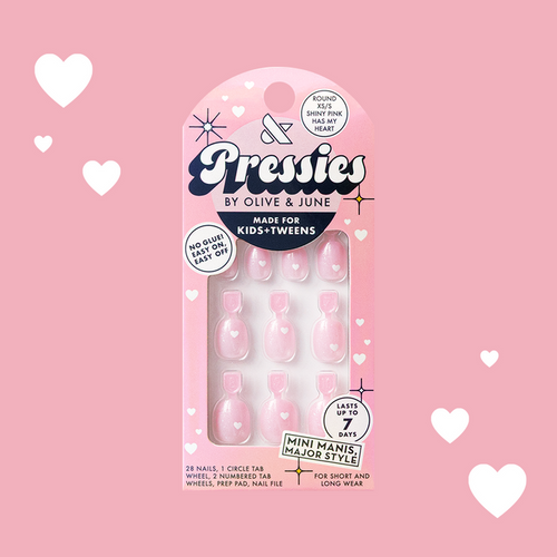 Shiny Pink Has My Heart - Pressies | Extra Short Short | Round showing pink heart-patterned press on false nails in packaging