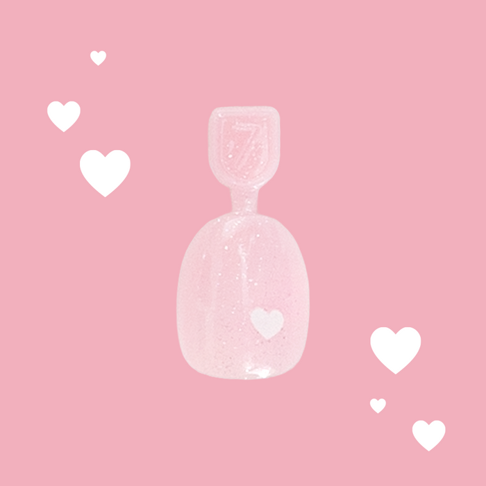 Shiny Pink Has My Heart - Pressies | Extra Short Short | Round showing a shimmer pink press on nail with heart detail on pink background
