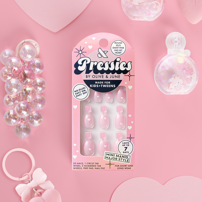 Shiny Pink Has My Heart - Pressies | Extra Short Short | Round showing pink shimmer round press on nails in packaging on pink background