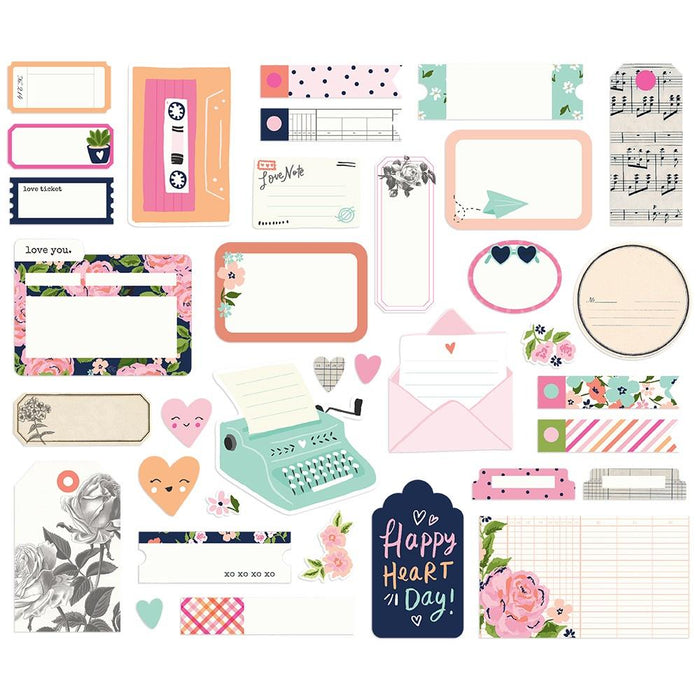 Simple Stories - Happy Hearts - Bits & Pieces Die-Cuts - 35/Pkg - Journal. Die-Cuts are a great addition to scrapbook pages, greeting cards and more! The perfect embellishment for all your paper crafting needs! Package contains Simple Stories Journal Bits, 35 coordinating die-cuts. Imported. Available at Embellish Away located in Bowmanville Ontario Canada.