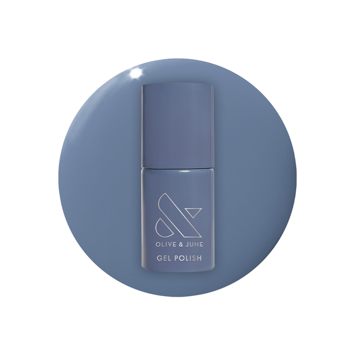 Bottle of Slate - Gel polish in midtone slate blue with a calm and chic finish against a white background