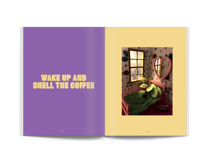 Open book spread: purple page with yellow text and a right page photo of a snail