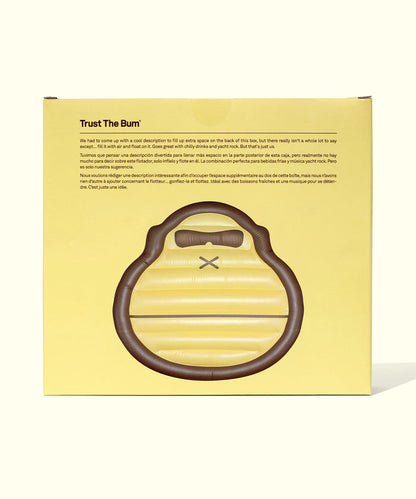 Yellow and brown inflatable Sonny Pool Float with handle, perfect for relaxing in the water, Sun Bum.