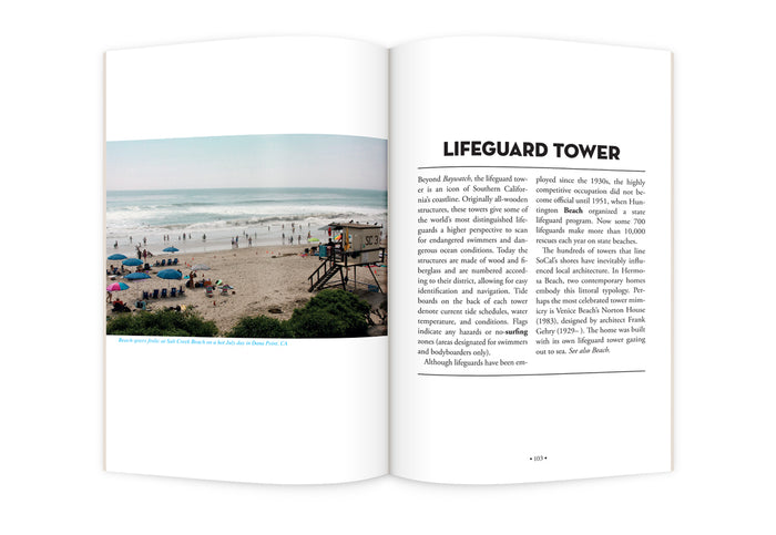 Open photo book with beach scene and lifeguard tower text page layout