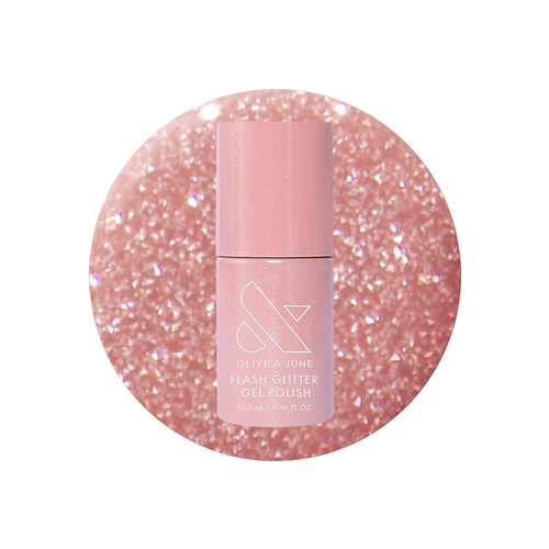 Sparkly Pink Drink Gel bottle on a sparkling blush pink glitter background for gel polish mani look