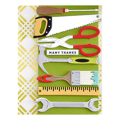 Spellbinders - Etched Dies By Nancy McCabe - Toolbox Essentials - All The Tools. This set includes 25 thin metal cutting dies. It indeed has all the tools from a hammer to a saw and even a ruler! Available at Embellish Away located in Bowmanville Ontario Canada. Example by brand ambassador.