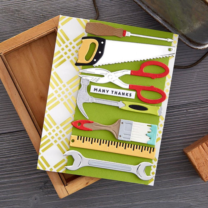 Spellbinders - Etched Dies By Nancy McCabe - Toolbox Essentials - All The Tools. This set includes 25 thin metal cutting dies. It indeed has all the tools from a hammer to a saw and even a ruler! Available at Embellish Away located in Bowmanville Ontario Canada. Example by brand ambassador.