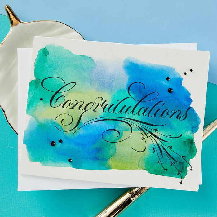 Spellbinders - Press Plate By Paul Antonio - Copperplate - Congratulations. Copperplate Congratulations Press Plate is from the Copperplate Everyday Sentiments Collection by Paul Antonio. Available at Embellish Away located in Bowmanville Ontario Canada. Example by brand ambassador.