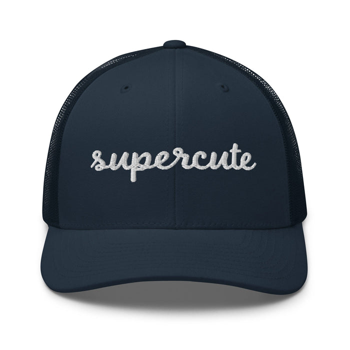 navy cap with "supercute" text on a white background