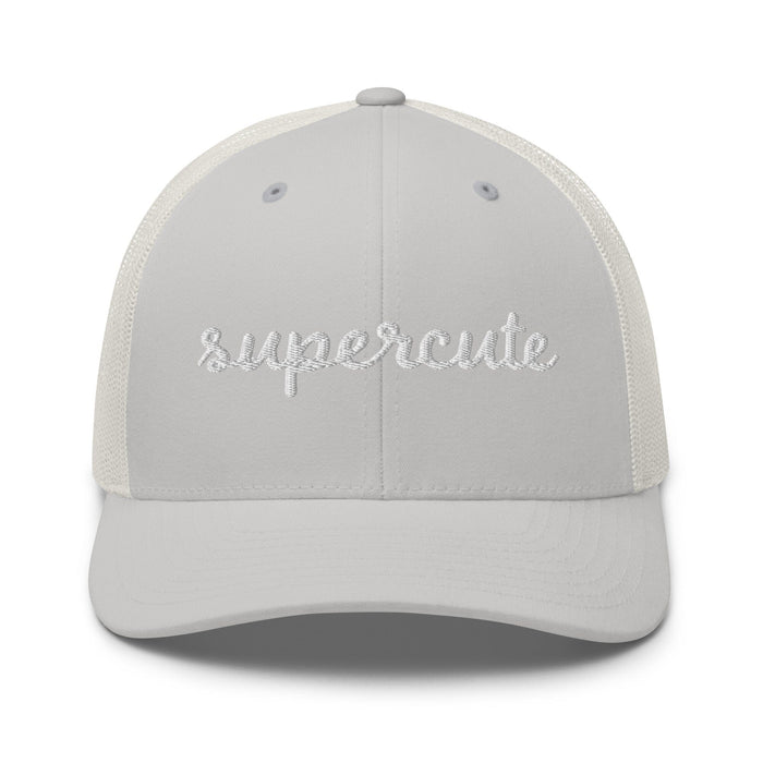 silver trucker cap with "supercute" text on a white background