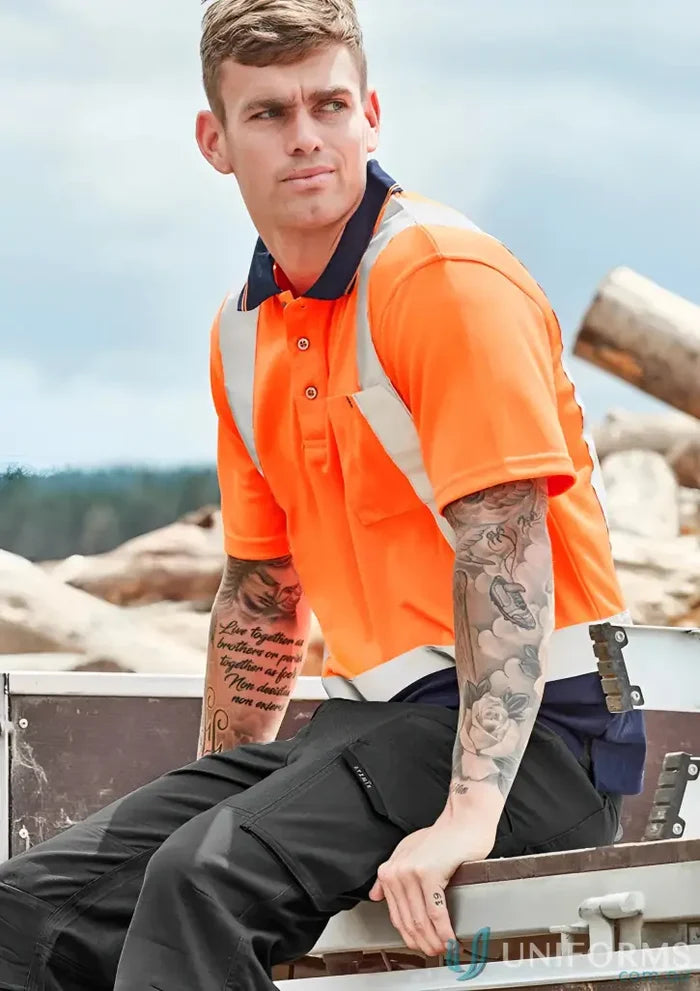 Man in Syzmic Hi Vis Spliced SS Polo with reflective shoulder tape for visibility