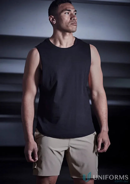 Man in black tank top and khaki shorts wearing Syzmik Men’s Streetworx board shorts