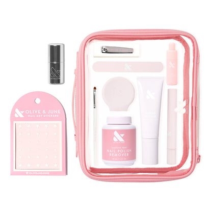 The Mani Weekender - 6 Polishes kit with nail polish remover, hand care products, nail clipper, brushes, and nail art stickers in pink pouch