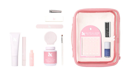 The Mani Weekender - 6 Polishes kit with nail care tools, remover, hand serum, polish, and nail art stickers in clear pink pouch