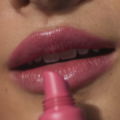 Tint Me Lip Punch lip balm, pink lips with applicator tip close-up
