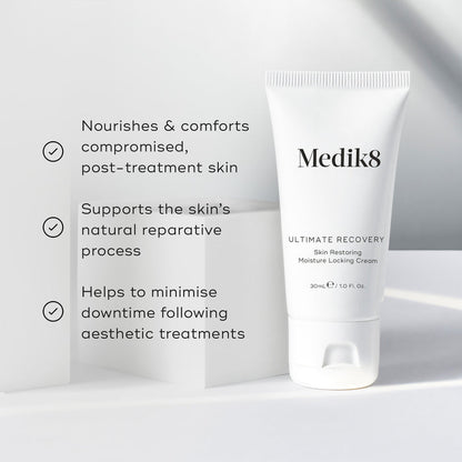 Medik8 Ultimate Recovery Skin Restoring Moisture Locking Cream tube sits against a clean white architectural background. Text claims the product nourishes compromised post-treatment skin, supports the natural reparative process, and minimizes downtime following aesthetic treatments.