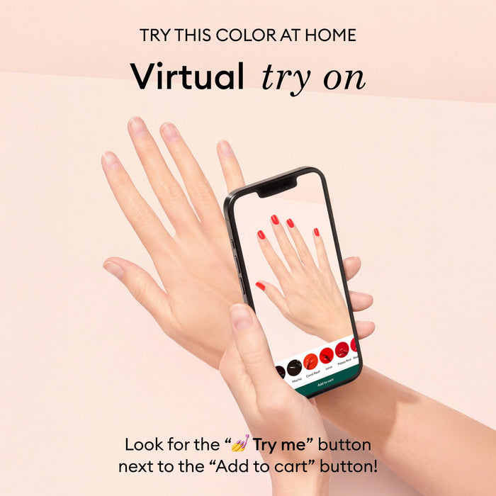 A hand holds a phone showing Manucurist's Ultramarine virtual try-on, displaying vibrant blue gel polish on nails. Text invites users to try this bold color at home with the app.