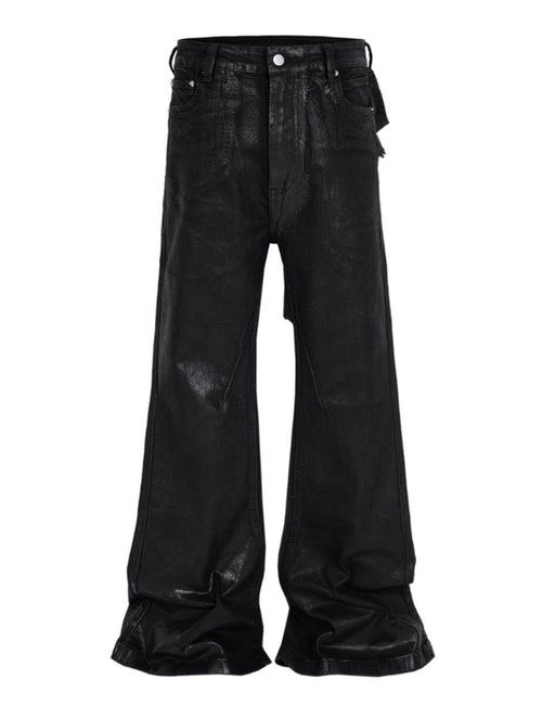 Heavyweight black denim jeans with wide flare legs and patchwork rear detailing