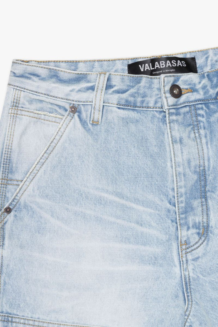 Front view of Valabasas Mr Straight light blue wash denim jeans highlighting button and zipper closure