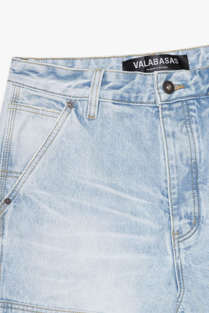 Front view of Valabasas Mr Straight light blue wash denim jeans highlighting button and zipper closure