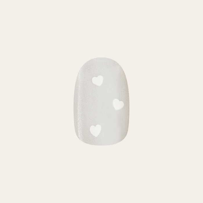 Velvet Pearly Hearts - Tab Press On | Extra Short | Round false nail with soft pearly velvet and white heart details