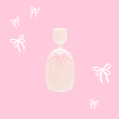 Wrapped in Pink - Pressies | Short Medium | Round showing baby pink french press on nail with 3D bow detail on pink background