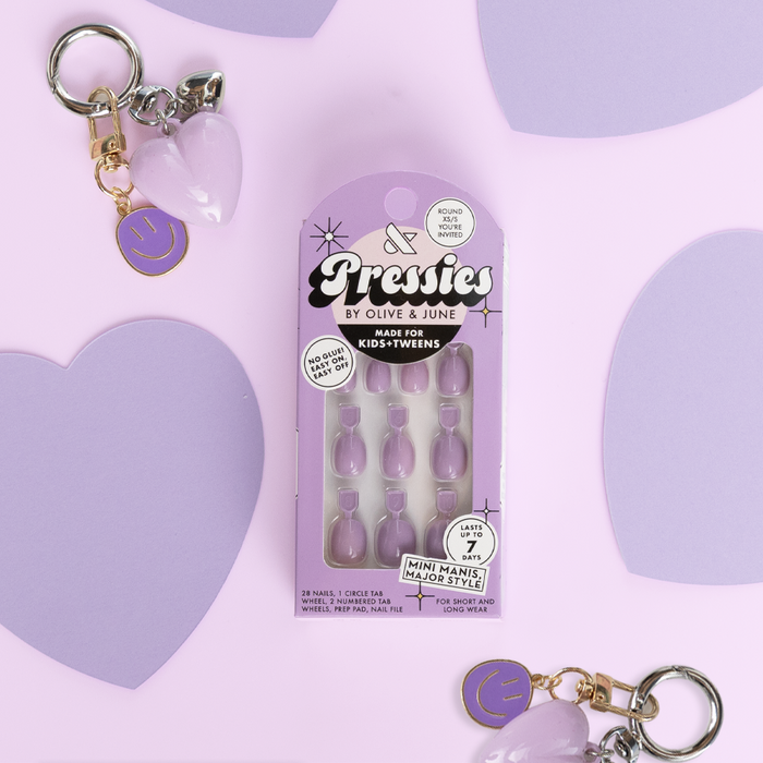 You're Invited - Pressies | Extra Short Short | Round showing pastel purple press on false nails in packaging on light purple background